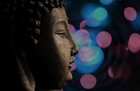 buddha and abstract lights background