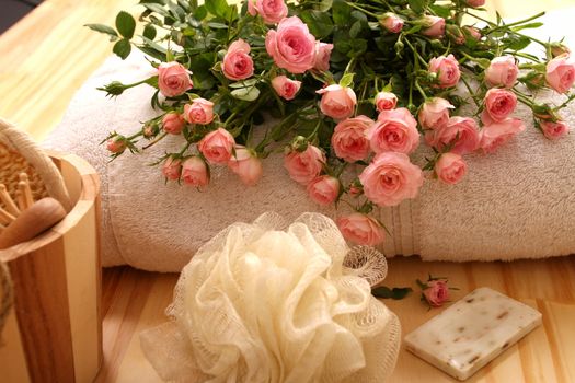 Roses, towels and spa accessories