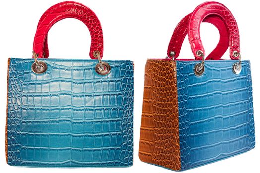 Square female handbags, blue ,red, brown in faux crocodile leather. One seen from the front and the other from the short side.