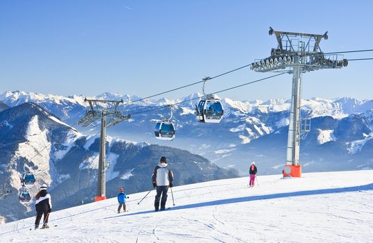 Skiers on the slope ski resort  Zell am See, Austrian 