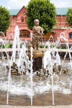 Statue of a little girl in the fountain
