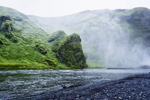 Skoga river near Skogafoss waterfall in Iceland, summer