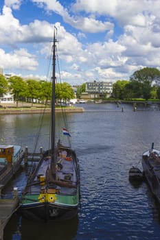 Ships parked near the shore in Amsterdam