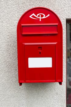 Modern red Mailbox in Iceland. Horizontal shot