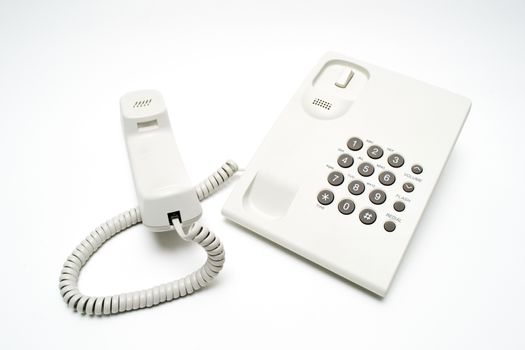 Office telephone on white background