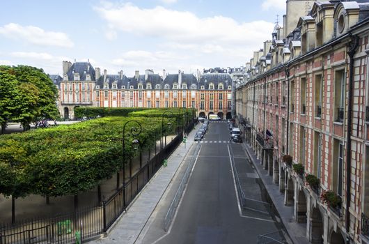 The view on Place des Vosges with the Square Louis XIII from the window of the Victor Hugo's House, Paris, France