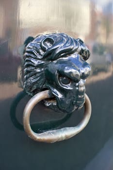 closeup of decorative traditional Dutch lion head door knob