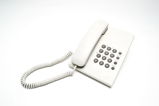 Office telephone on white background