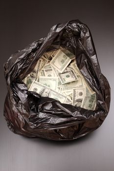 A Rubbish bag full of dollars