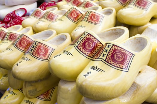 Dutch traditional wooden shoes with ornament, clogs, symbol of the Netherlands.