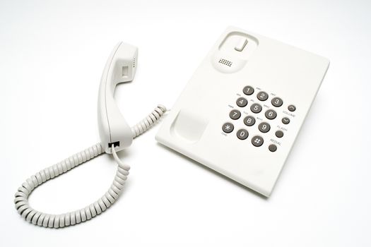 Office telephone on white background