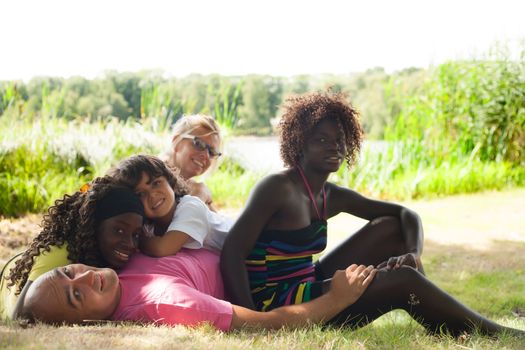 Happy multicultural family having a nice summer day