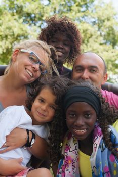 Happy multicultural family having a nice summer day