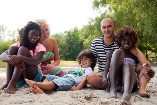 Happy multicultural family having a nice summer day