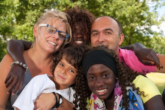 Happy multicultural family having a nice summer day