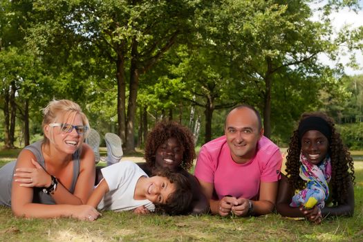 Happy multicultural family having a nice summer day