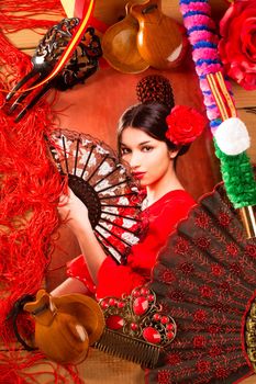 Flamenco woman with bullfighter and typical Spain Espana elements like castanets fan and comb