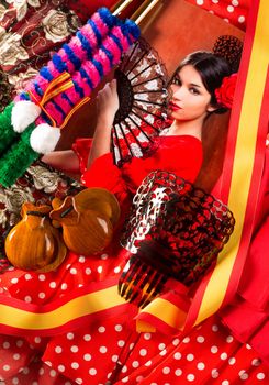 Flamenco woman with bullfighter and typical Spain Espana elements like castanets fan and comb