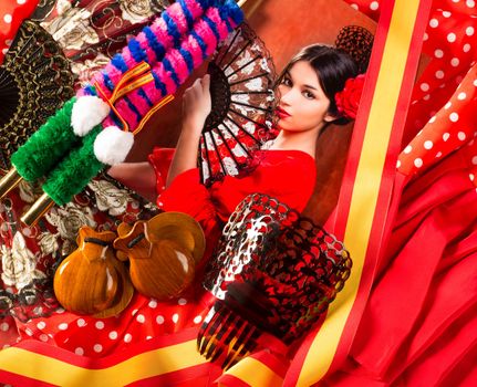 Flamenco woman with bullfighter and typical Spain Espana elements like castanets fan and comb