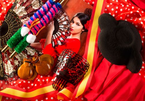 Flamenco woman with bullfighter and typical Spain Espana elements like castanets fan and comb