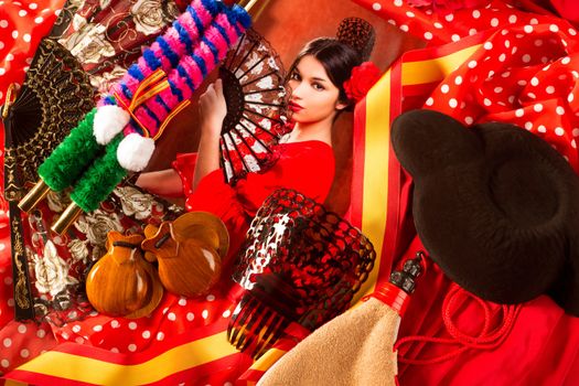 Flamenco woman with bullfighter and typical Spain Espana elements like castanets fan and comb