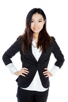 Attractive asian girl in her twenties isolated on a plein background shot in a studio