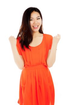 Attractive asian girl in her twenties isolated on a plein background shot in a studio