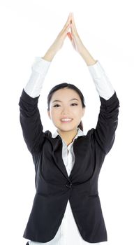 Attractive asian girl in her twenties isolated on a plein background shot in a studio