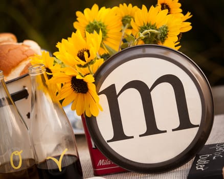 Beautiful rustic table setting with the letter "M" incorporated.