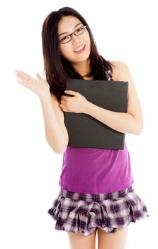 Attractive asian girl in her twenties isolated on a plein background shot in a studio