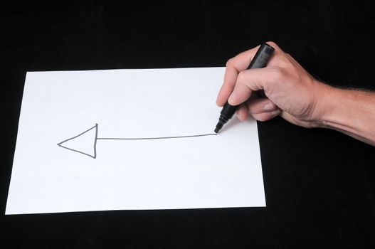 A Caucasian Male Hand Drawing on a White Paper