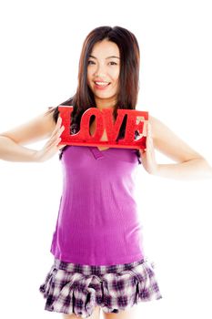 Attractive asian girl in her twenties isolated on a plein background shot in a studio