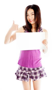 Attractive asian girl in her twenties isolated on a plein background shot in a studio