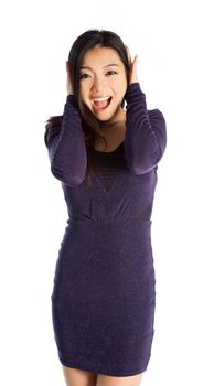 Attractive asian girl in her twenties isolated on a plein background shot in a studio