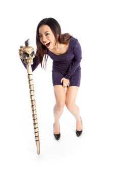 Attractive asian girl in her twenties isolated on a plein background shot in a studio