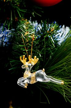 Reindeer antlers toy hanging on christmas tree, Christmas concept