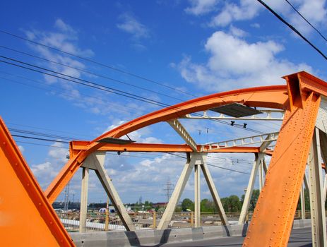 The bridge on a background of the cloudy sky