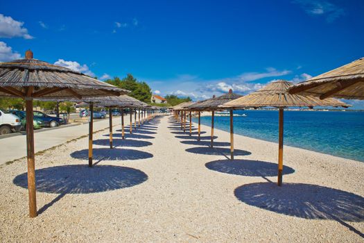 Island of Vir beach umbrellas, Dalmatia, croatia