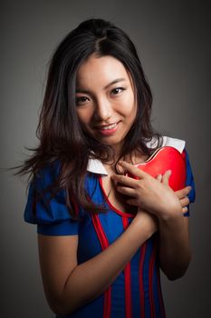 Romantic people in love shot in studio isolated on a grey background