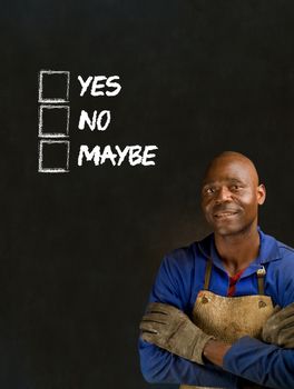 African black man industrial worker with chalk checklist on blackboard background
