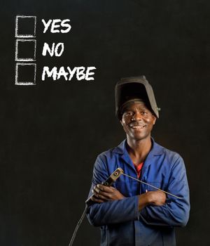 African black man industrial worker with chalk checklist on blackboard background