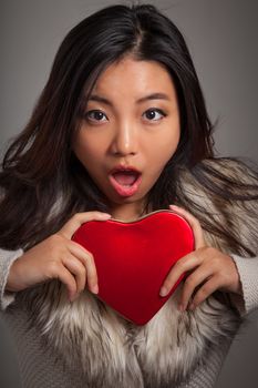 Romantic people in love shot in studio isolated on a grey background