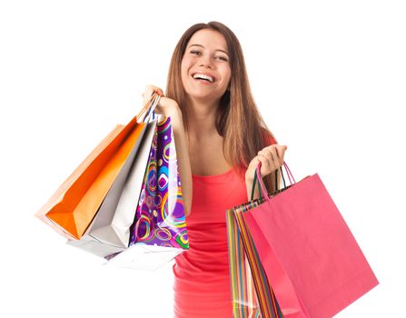 Happy woman with shopping bags, isolated on white