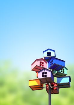 Colorful nesting boxes on blue sky