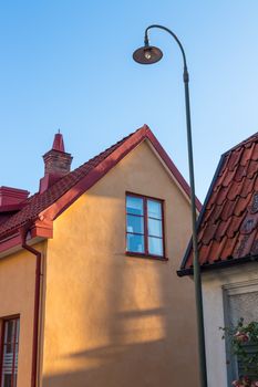 House in evening sunlight. Visby, a medieval town on the island of Gotland, Sweden.