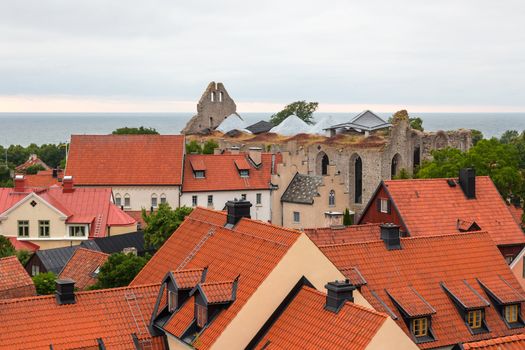 Rooftops and ruins of a medieval church. Visby, capital of Gotland, Sweden.