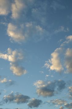 A blue cloudy sky photographed at sunset