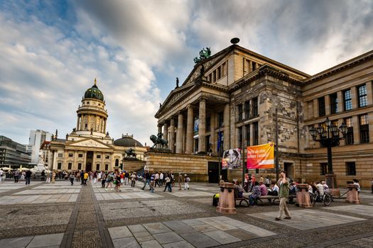 BERLIN, GERMANY - AUGUST 10: German Cathedral and Gendarmenmarkt Square on August 10, 2013 in Berlin, Germany. The square was created by Johann Arnold Nering at the end of the seventeenth century.