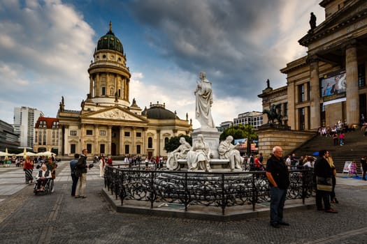 BERLIN, GERMANY - AUGUST 10: German Cathedral and Gendarmenmarkt Square on August 10, 2013 in Berlin, Germany. The square was created by Johann Arnold Nering at the end of the seventeenth century.