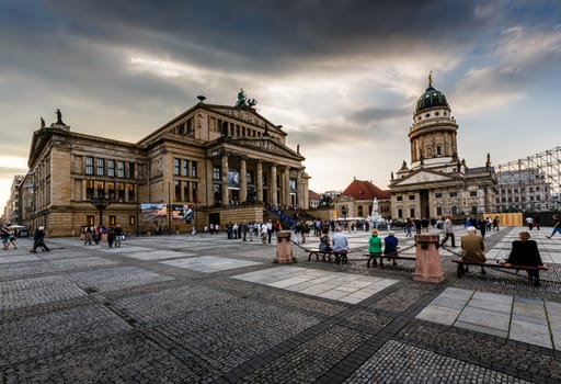 BERLIN, GERMANY - AUGUST 10: French Cathedral and Gendarmenmarkt Square on August 10, 2013 in Berlin, Germany. The square was created by Johann Arnold Nering at the end of the seventeenth century.